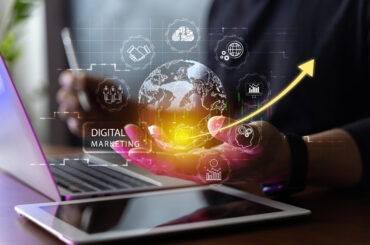 Digital online marketing. Businessman using tablet and analyzing sales data graph growth on modern interface icon on strategy. Solution analysis and content development related to network connectivity